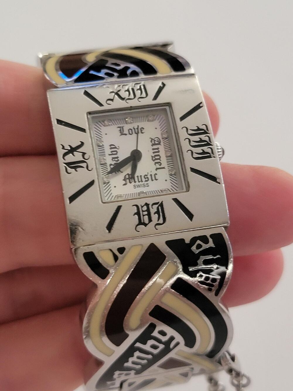 L.A.M.B. Womens Watch Love Angel Music White Dial Silver Enamel Bracelet Quartz
